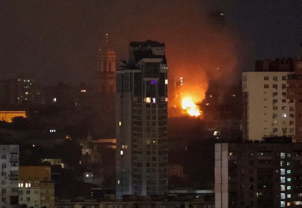 Fire and smoke rise over the Dormition Cathedral of the Kyiv Pechersk Lavra in Kyiv (Reuters)