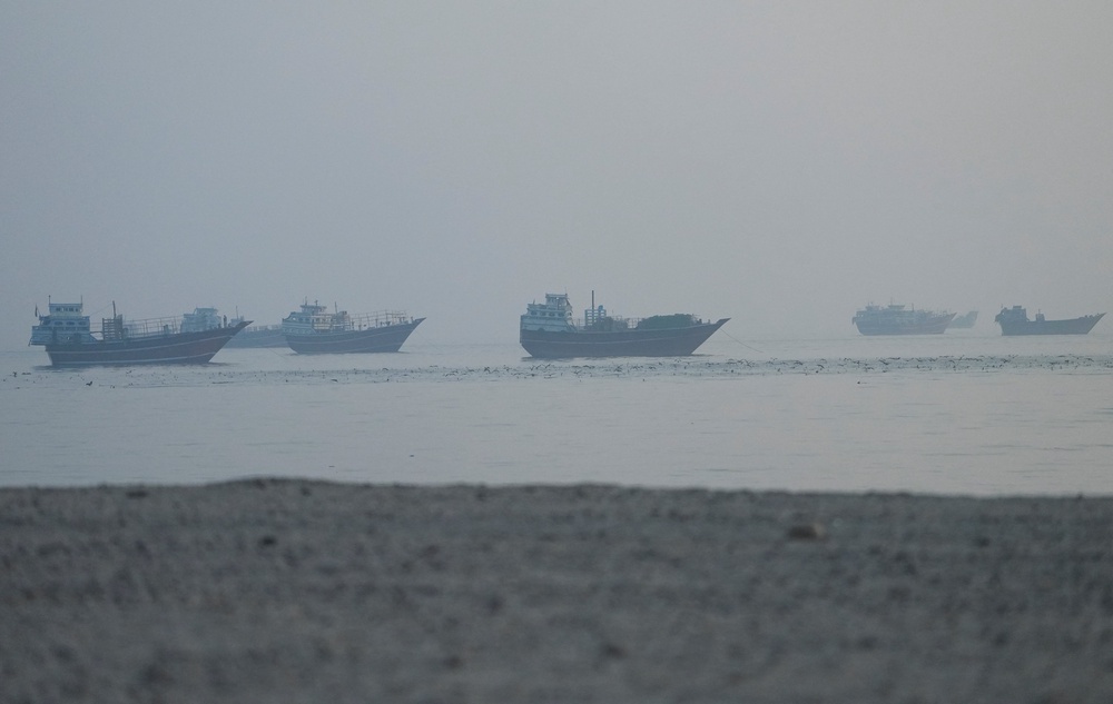 Vessels in the Strait of Hormuz, as seen from Musandam, Oman, June 15 (Reuters)