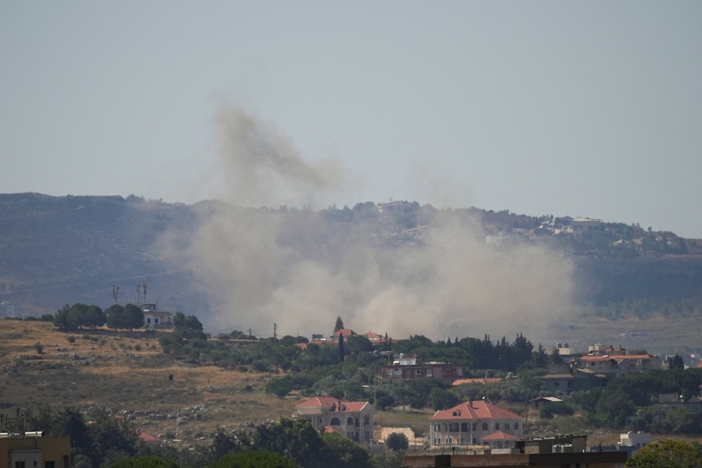 Smoke rises following an Israeli strike in Nabatieh, Lebanon, on Monday 15 June (Reuters)