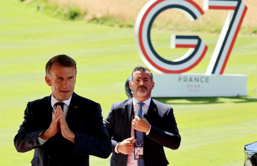 French president Emmanuel Macron arrives at the Hotel Royal ahead of the start of the G7 summit in France (Reuters)