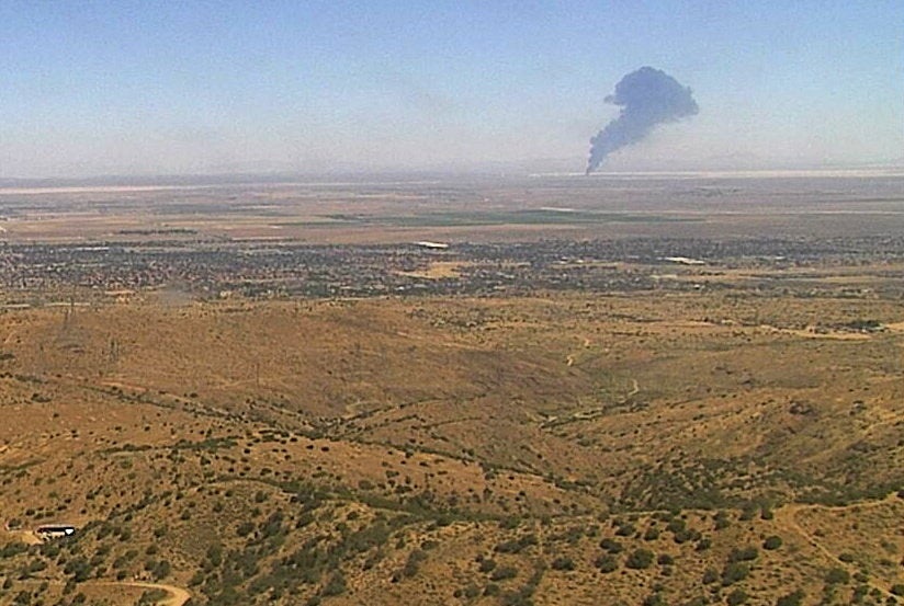 Smoke rises from Edwards Air Force Base after the crash (Reuters)