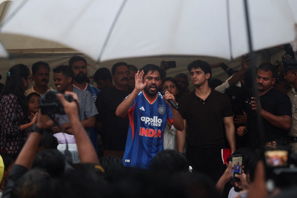 Abhijeet Dipke addresses the supporters during a sit-in protest demanding the resignation of India’s education minister in Bengaluru (Reuters)
