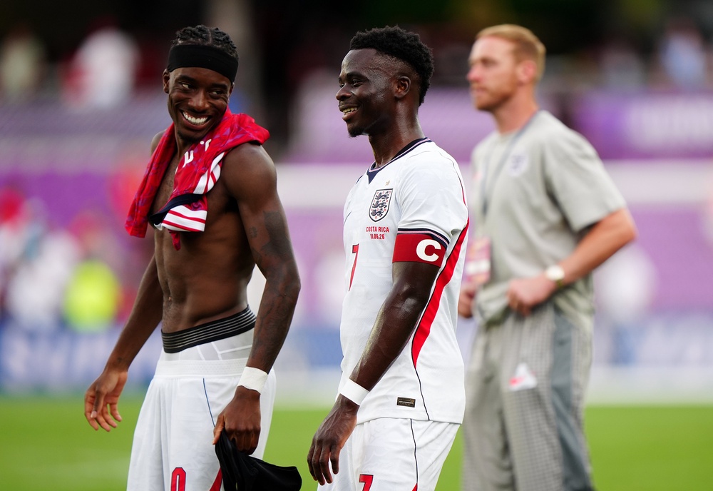 Noni Madueke (left) and Bukayo Saka are both viable options on the wing for England (PA)