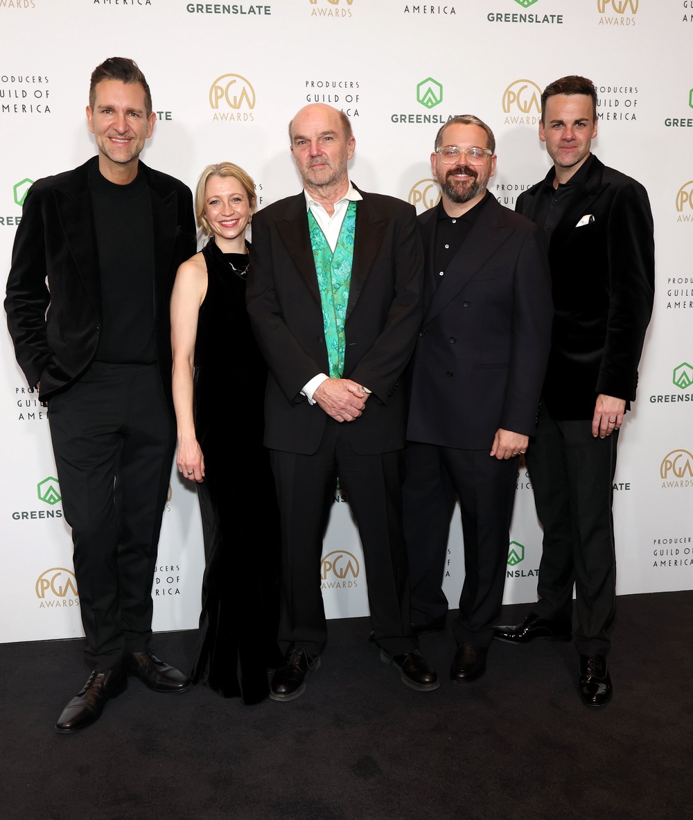 Stephen Lambert (centre) attends the  2026 Producers Guild Awards (Getty)