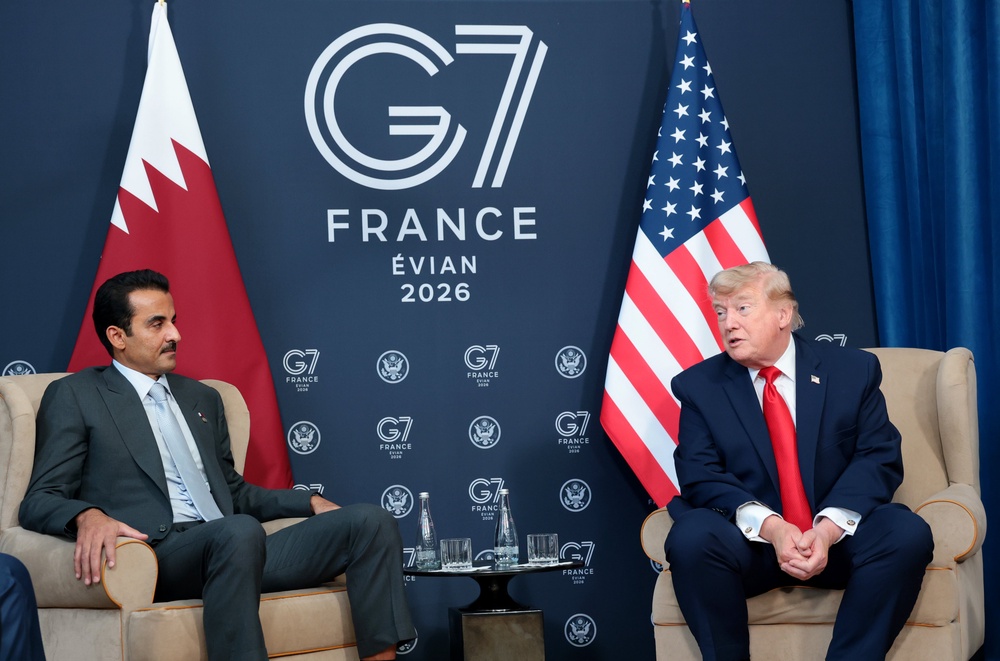 Donald Trump (R) participates in a bilateral meeting with the Emir of Qatar, Sheikh Tamim bin Hamad Al Thani (L) on June 16, 2026 in Evian-les-Bains (Getty)