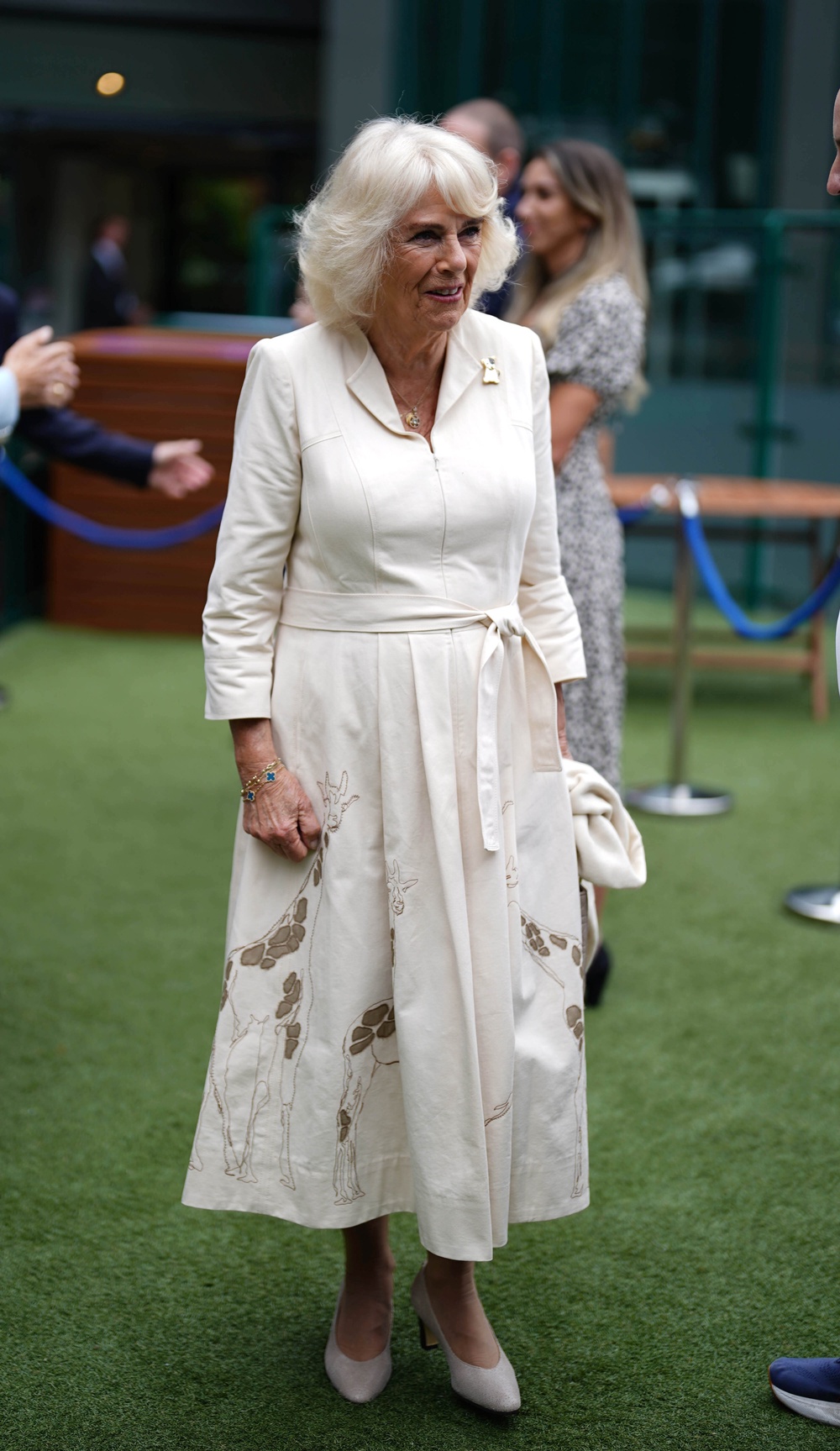 Queen Camilla wore all white for Wimbledon (Jordan Pettitt/PA)