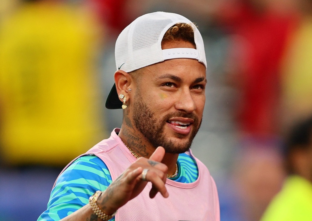 Neymar was with the team for Brazil’s opener despite not being able to play (Reuters)