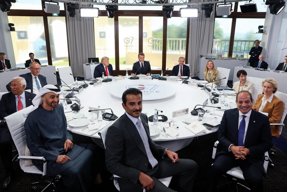 (From L) European Council President Antonio Costa, Germany's Chancellor Friedrich Merz, UAE's President Sheikh Mohamed bin Zayed al-Nahyan, US President Donald Trump, Qatar's Emir Sheikh Tamim bin Hamad al-Thani, France's President Emmanuel Macron, Canada's Prime Minister Mark Carney, Italy's Prime Minister Giorgia Meloni, Egypt's President Abdel Fattah al-Sisi, Japan's Prime Minister Sanae Takaichi and European Commission President Ursula von der Leyen attend a work lunch as part of the G7 summit, in Evian, eastern France, on June 16 (AFP/Getty)
