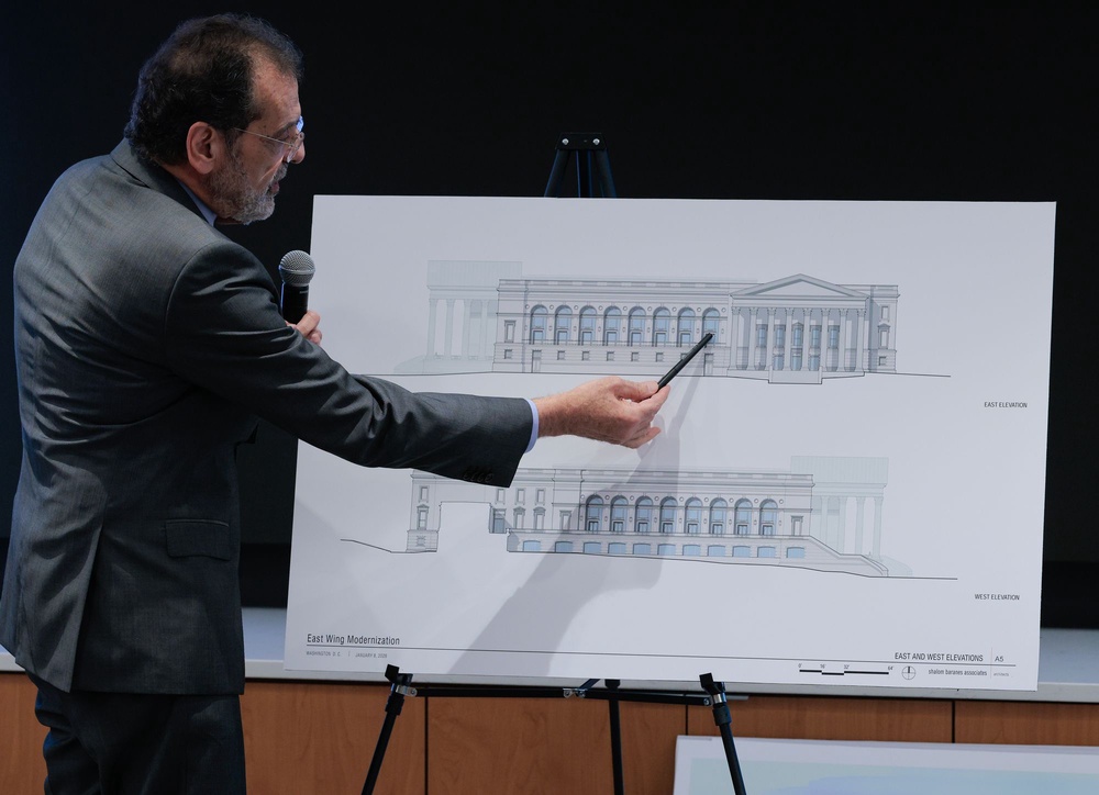 The proposed 90,000-square-foot venue would dwarf the main White House building. Pictured here, architect Shalom Baranes shows elevation drawings for the ballroom to members of the National Capital Planning Commission on January 08, 2026 in Washington, DC. (Getty Images)