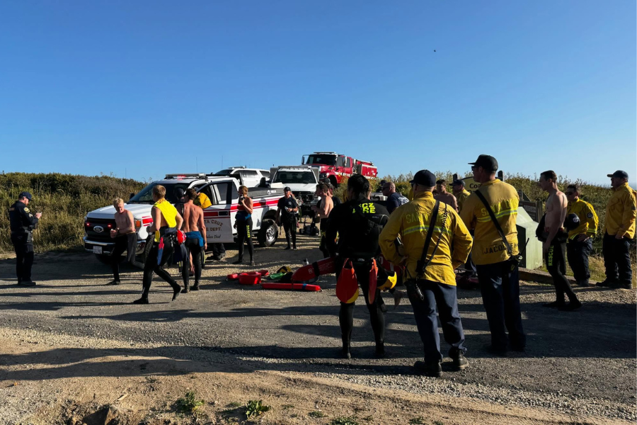 About eight rescue swimmers entered the water at Bonny Doon Beach after dangerous waves swept two sleeping college students into the ocean, ultimately leading to their deaths (CAL FIRE CZU San Mateo-Santa Cruz Unit)