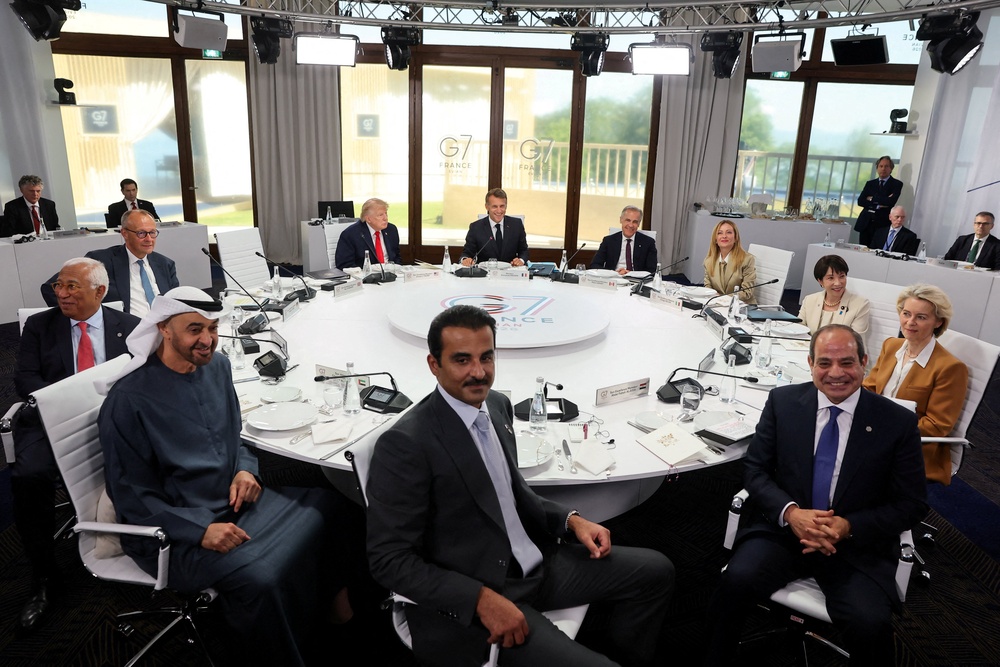 Takaichi, Merz, Meloni, Trump,von der Leyen, Carney, Costa, Macron alongside the Emir of Qatar, Sheikh Tamim bin Hamad Al Thani, President of the United Arab Emirates (UAE) Sheikh Mohamed bin Zayed Al Nahyan and Egyptian President Abdel Fattah al-Sisi on Tuesday (Reuters)
