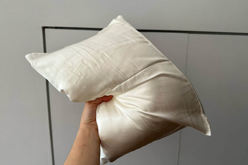 It doubles as an extra pillow for your trip (Alessia Armenise/The Independent)