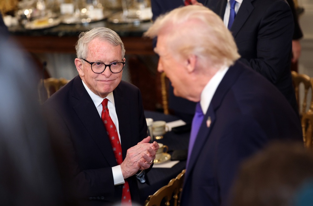 hio Governor Mike DeWine applauds as U.S. President Donald Trump arrives for a working breakfast with governors in the State Dining Room at the White House on February 20 (Getty)