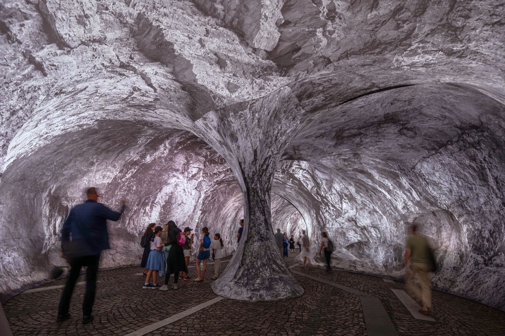 Made largely from printed fabric and air, the installation transforms the 17th-century bridge into an artificial cavern (AP Photo/Aurelien Morissard)