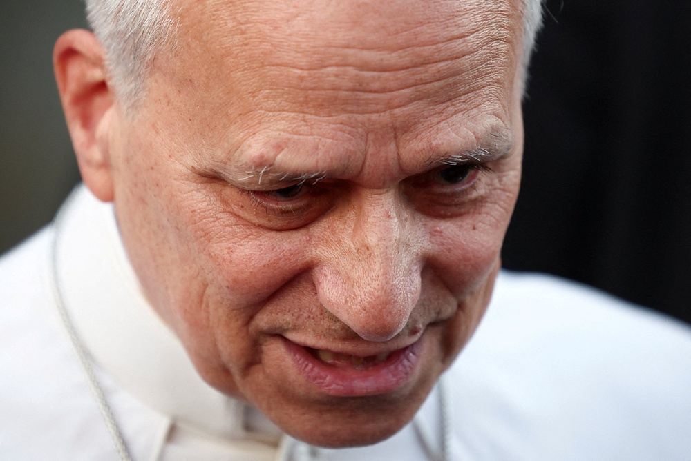 Pope Leo XIV speaks to journalists about the interim US-Iran peace deal as he leaves the papal residence to head back to the Vatican, in Castel Gandolfo, Italy, June 16 (Reuters)