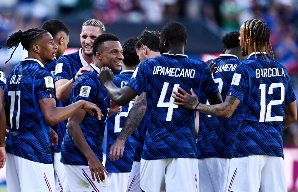 France's Kylian Mbappe celebrates scoring their third goal with Dayot Upamecano, Bradley Barcola, Adrien Rabiot, Michael Olise and teammates (Reuters)
