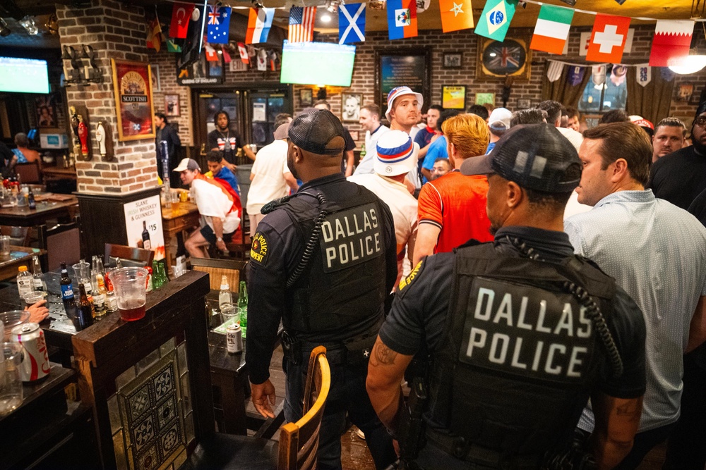 England fans are asked to leave by Dallas Police at the Londoner Pub. (James Manning/PA)