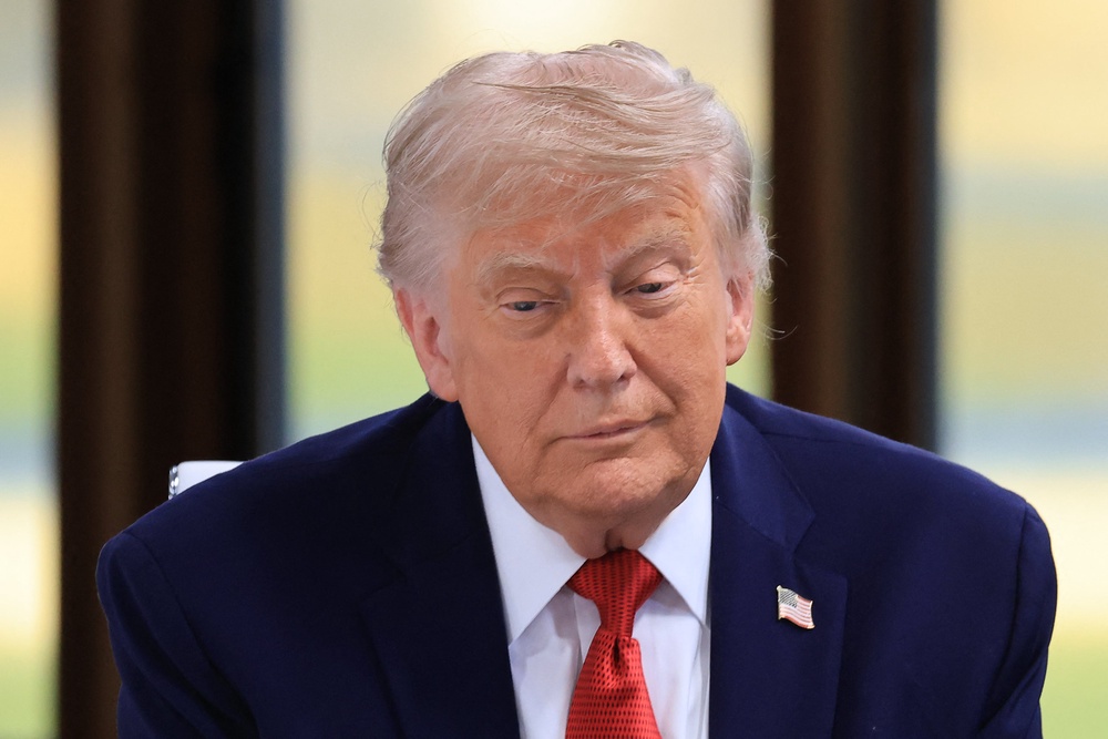 President Trump has come under fire for a social media post threatening that “a whole civilisation will die tonight” (AFP/Getty)