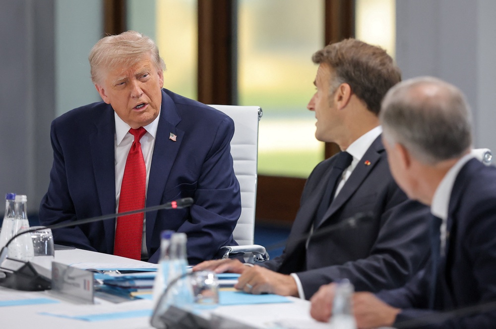 Donald Trump and French President Emmanuel Macron attend a working session with G7 leaders (Reuters)