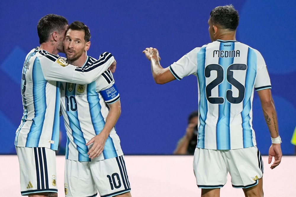 Lionel Messi celebrated with teammates after each goal (AP)