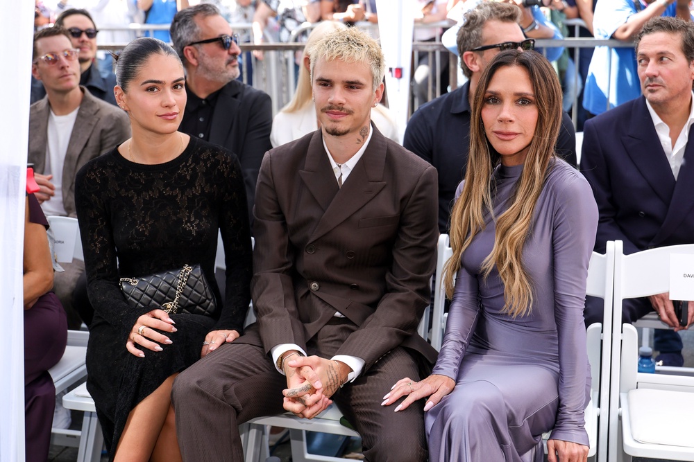 Kim Turnball,  Romeo Beckham and Victoria Beckham attend David Beckham's Hollywood Walk of Fame Star Ceremony on 12 June (Getty)