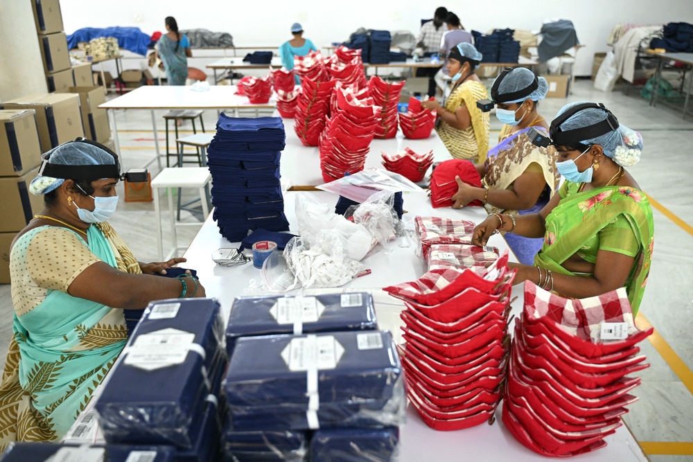 This photograph taken on 12  May 2026 shows women working inside a factory in Tamil Nadu's Karur district (AFP/Getty)