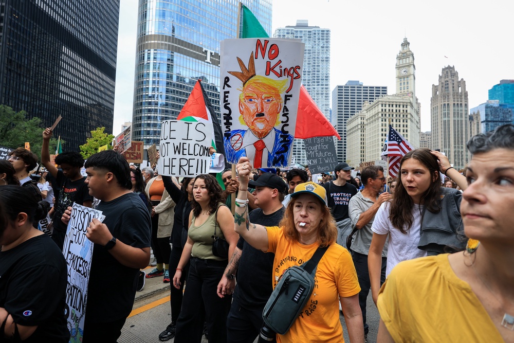 Trump Tower, which is emblazoned with the president’s name, has long served as a focus point for protests in Chicago. Pictured here, people take part in a ‘No Kings’ demonstration outside the skyscraper in March (Getty Images)