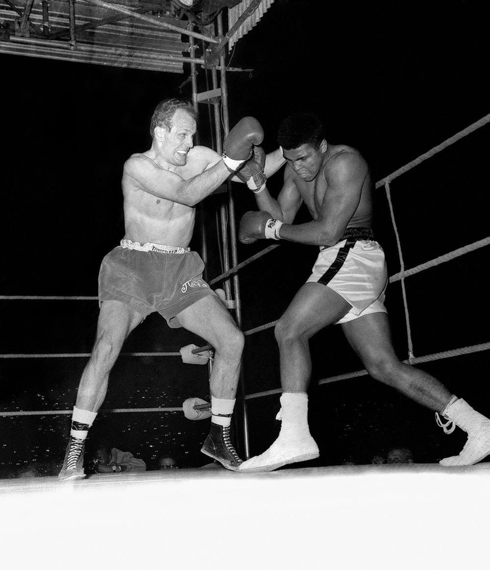 Henry Cooper rocked Cassius Clay on this day in 1963 (PA) (PA Archive)