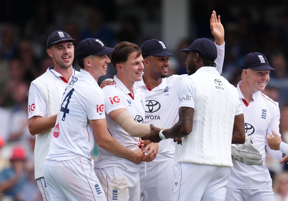Baker (third left) celebrates taking the wicket of New Zealand’s Rachin Ravindra (Ben Whitley/PA) (PA Wire)