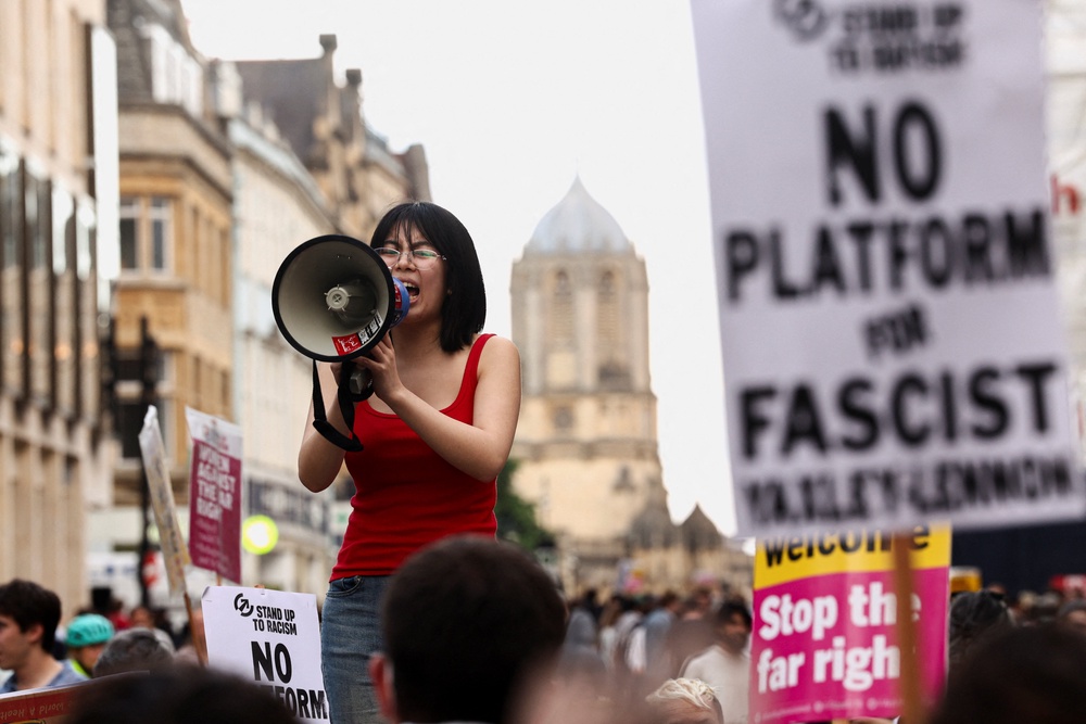 The protestors chanted slogans such as “Oxford Union, shame, shame” (Reuters)