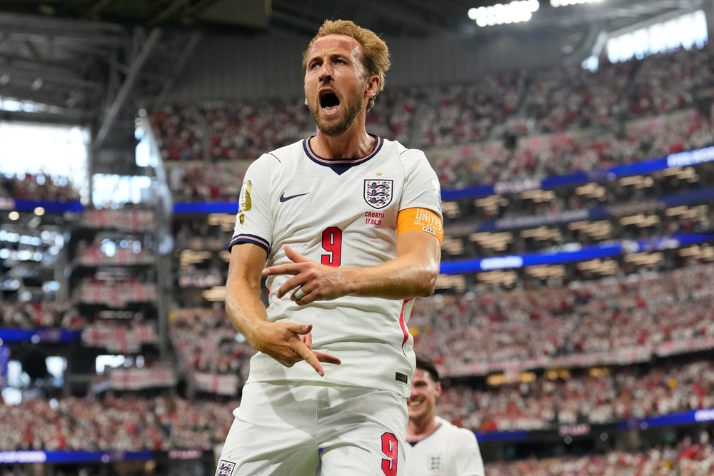 England captain Harry Kane celebrates a goal (AP)