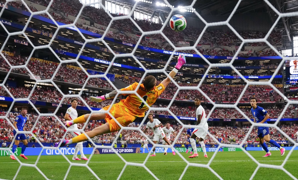 Jordan Pickford could not keep out Martin Baturina’s effort despite getting a hand to the ball (Bradley Collyer/PA) (PA Wire)