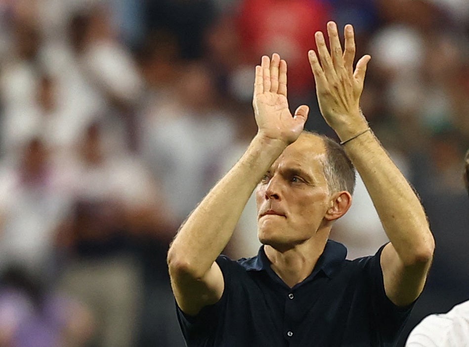England manager Thomas Tuchel applauds their fans after the match (Reuters)