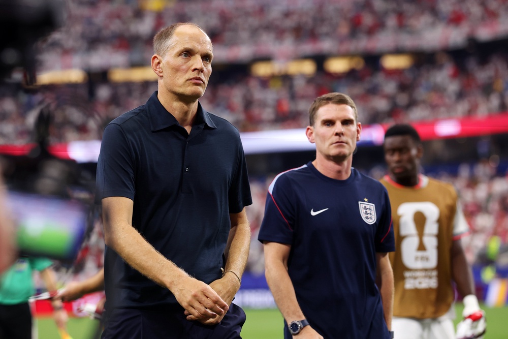 Tuchel and his assistant Anthony Barry leave the field (Getty)