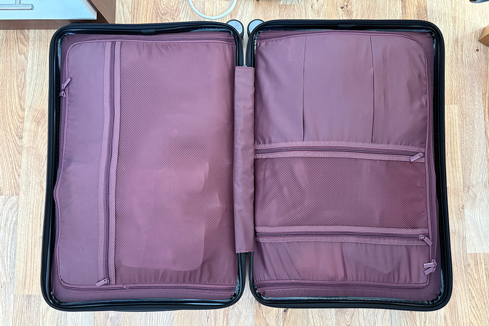 Both compartments in the suitcase come with zipped covers (Sabrina Sahota/The Independent)