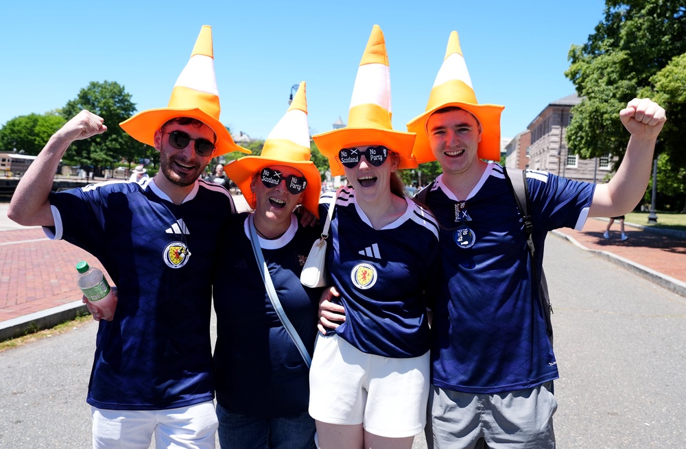 The cone has also become novelty headgear (Martin Rickett/PA) (PA Wire)
