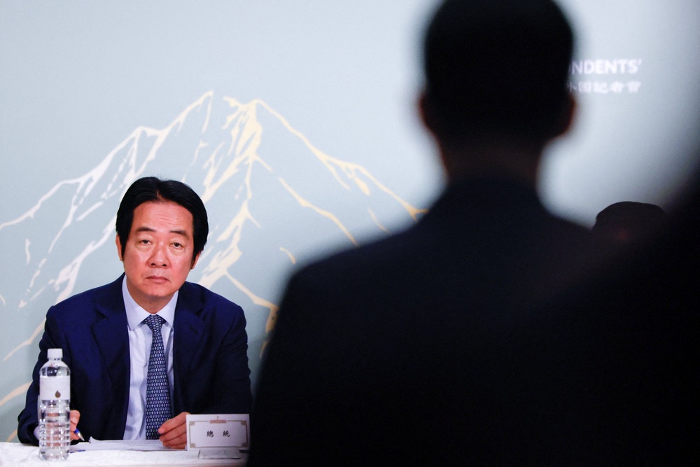 Taiwan President Lai Ching-te takes notes as a reporter asks a question during a press conference with the Taiwan Foreign Correspondents’ Club in Taipei, Taiwan, June 18 (Reuters)