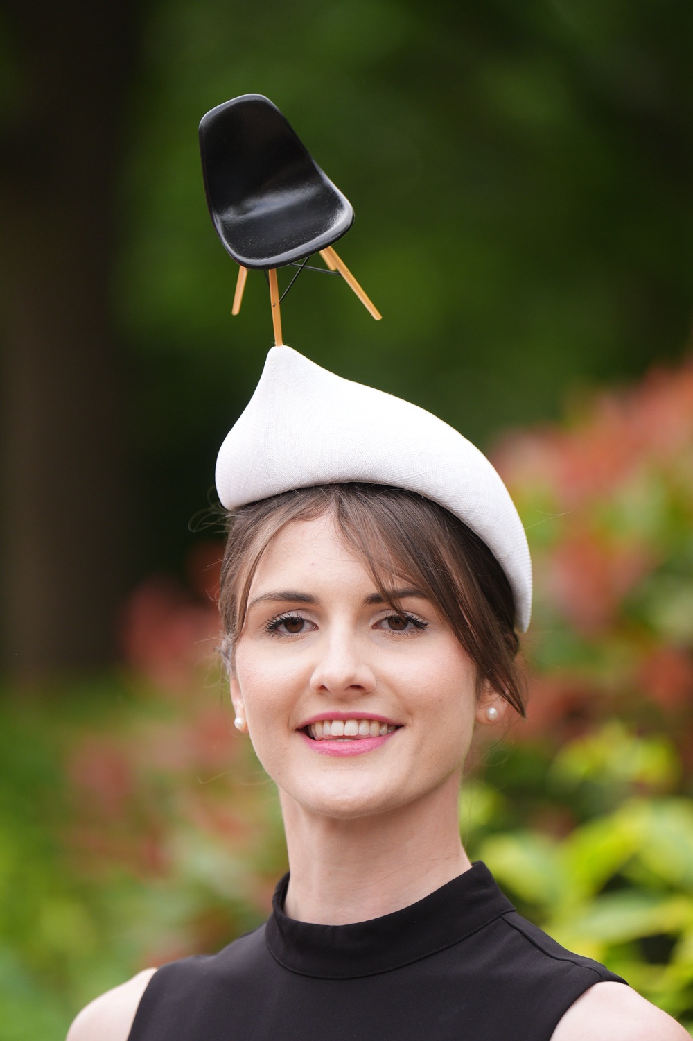 Model Laura wearing an unusual hat by Odette and Elliott (Aaron Chown/PA) (PA Wire)