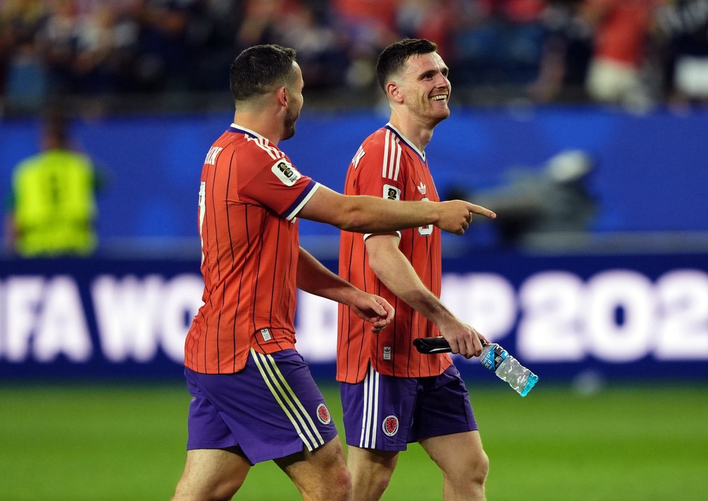 McGinn and captain Andy Robertson have formed the double act that has underpinned Steve Clarke’s regime (PA)