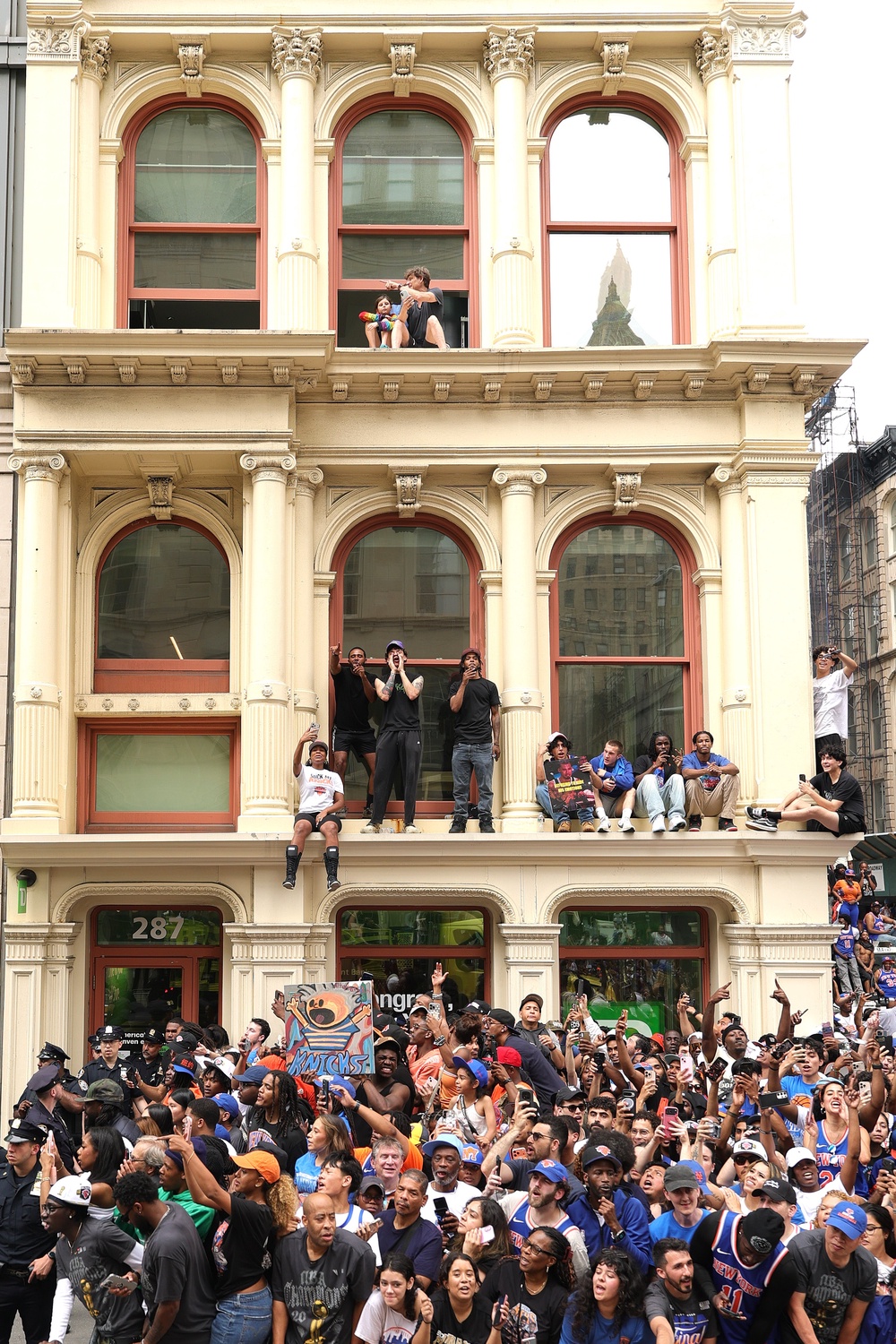 They resorted to finding their own viewpoint after viewing areas hit capacity hours before the parade started (Getty Images)