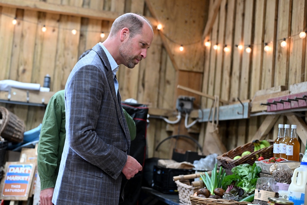 William examines the produce (Hugh Hastings/PA) (PA Wire)
