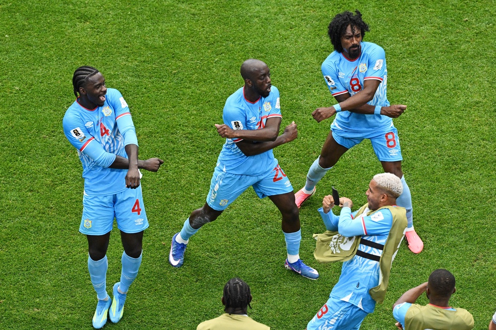 DR Congo players celebrate Yoane Wissa's equaliser against Portugal (Reuters)