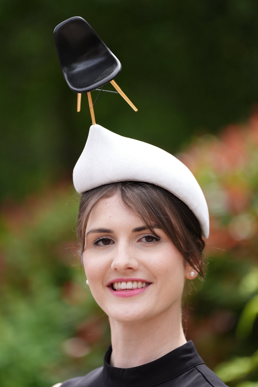 Laura Simpson wearing the eye-catching chair hat (Jonathan Brady/PA) (PA Wire)