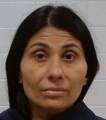 A scheming duo has been arrested in what federal prosecutors are calling a 'fortune teller fraud' that allegedly milked money from customers for a financial 'cleanse' (Collin County Jail)