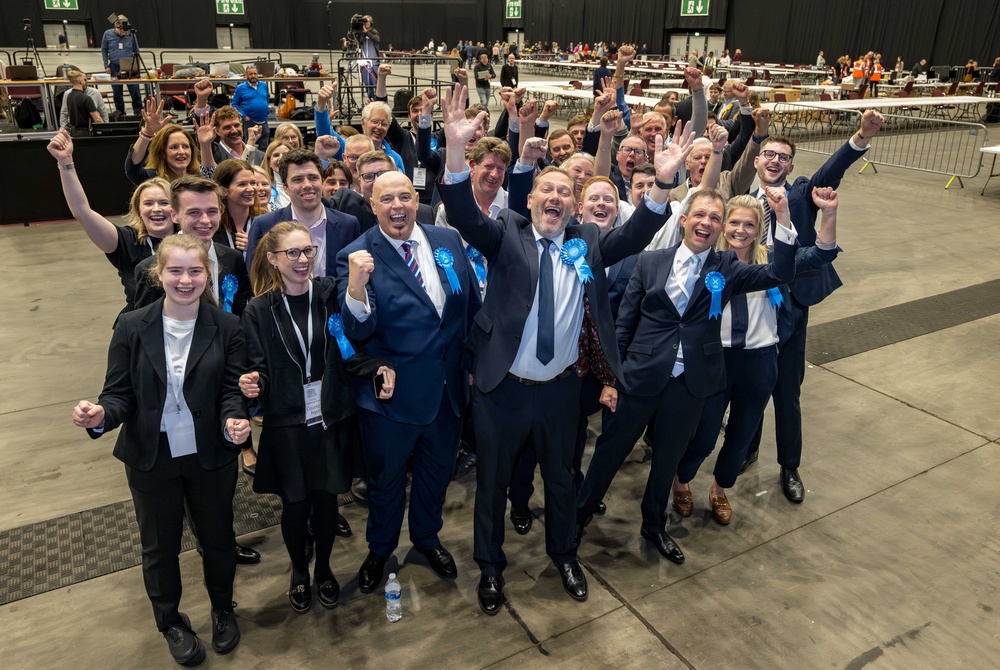 Douglas Lumsden (front row centre) celebrates with supporters at P&J Live in Aberdeen (PA)