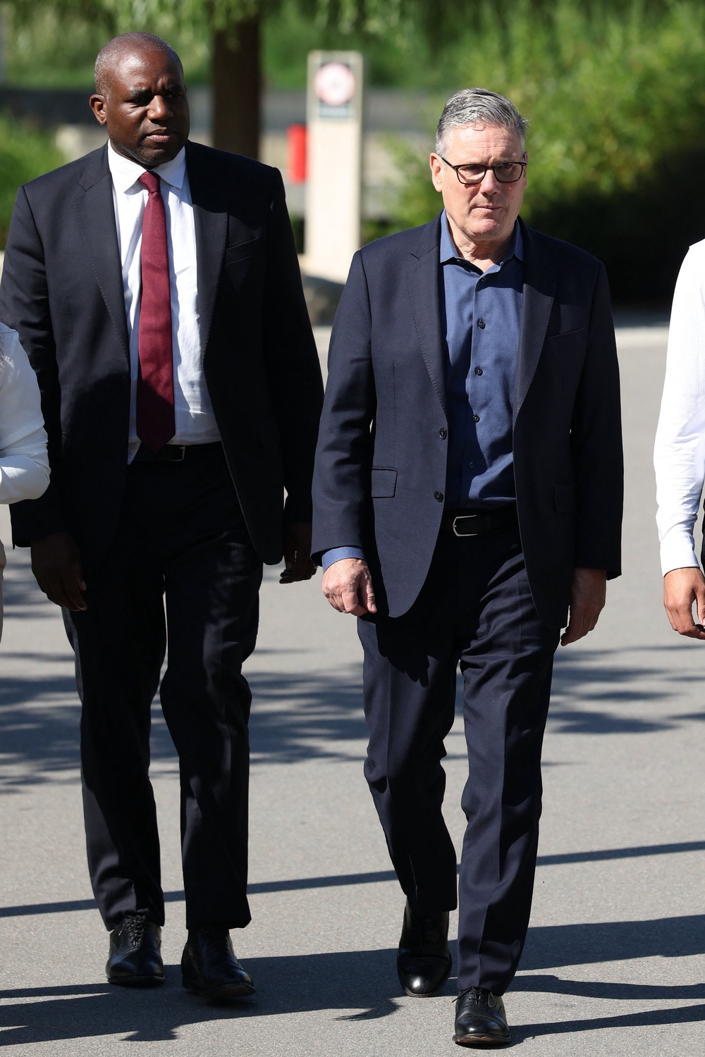 The prime minister pictured arriving with David Lammy (AFP/Getty)