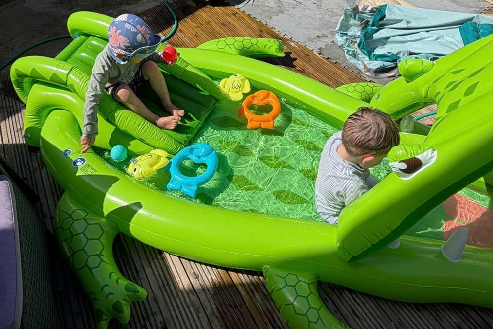 The croc’s mouth also sprays water on the tail, which doubles as a slide (Rebecca Moore/The Independent)