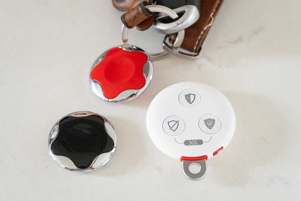 Verisure systems come with key fobs for arming and disarming the system with a tap against the SVK control unit or optional door lock (Alistair Charlton / The Independent)