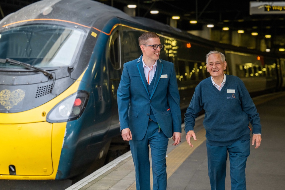Bob with his grandson, Nick, who is also an Avanti West Coast train manager (Avanti West Coast/PA)