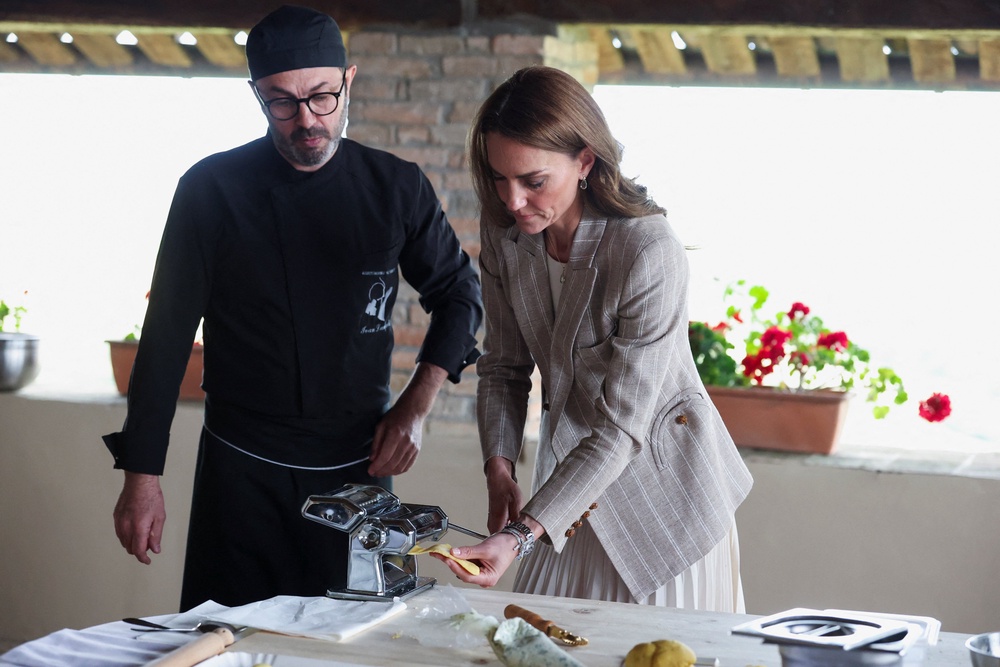 During her time in Italy, Kate helped prepare lunch at the rural Agriturismo Al Vigneto in Reggio Emilia (Phil Noble/PA) (PA Wire)
